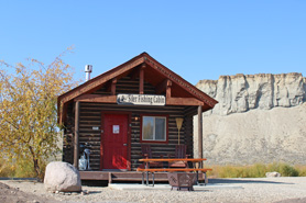 Outside view of cabin at Muddy Creek Cabins at the base of Kremmling Cliffs in Kremmling, Colorado
