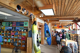 Inside view of retail gear shop and rental counter at Rocky Mountain Adventures Rafting Trips, Kayak Instruction and Gear Rentals in Fort Collins, Colorado.