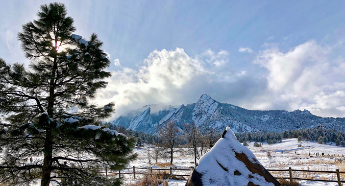 Snow covered Flatirons during winter in Boulder, Colorado.