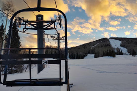 Chairlift during sunset at Cuchara Mountain Park Ski Area in Cuchara, Colorado.