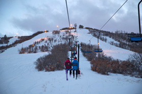 Night skiing view from the bottom of ski slope at Hesperus Ski Area near Durango, Colorado.