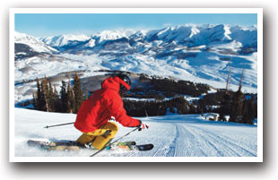 Skiing down a wide open slope at Crested Butte Ski Area in Colorado