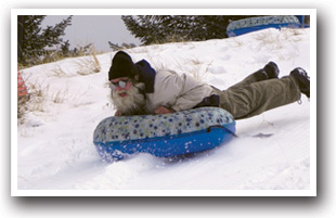 Man tubing near Grand Lake and Winter Park in Colorado.