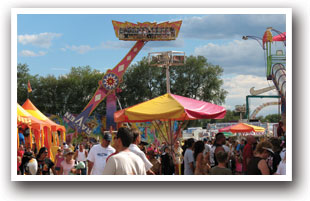 Crowds, rides and games at the Colorado State Fair, Pueblo, Colorado