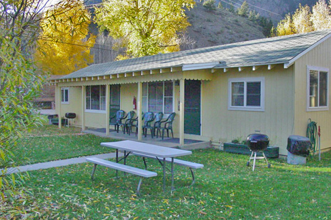 Front of cabin at Wagon Wheel Cabins Resort in Lake City, Colorado. Family Destination -- In Lake City -- Mountain Rustic Meets Simple Modern -- Wagon Wheel Cabins -- Non-Smoking -- Pet Friendly -- Your Home On The Road